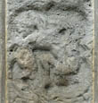 Panel 13:01 - Unidentified figure (badly eroded)